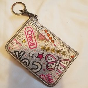 Small coach coins purse.